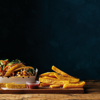 Dish made using McCain SureCrisp™ Steak Fries