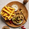 Dish made using McCain SureCrisp™ Steak Fries